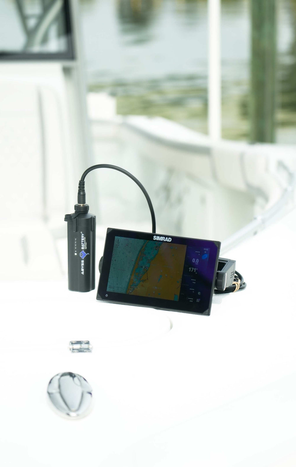 Power Cable Kit connecting SIMRAD ChartPlotter to Abyss electric fishing reel battery on boat deck